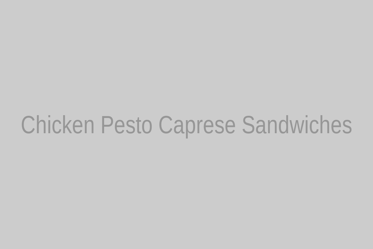 Chicken pesto Caprese sandwiches with shredded chicken, tomato, mozzarella, basil, and pesto