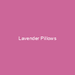 Lavender pillows on a mint green couch