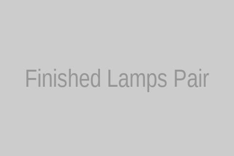 The pair of transformed lamps displayed in a home setting, demonstrating their new appeal and how they complement the decor.
