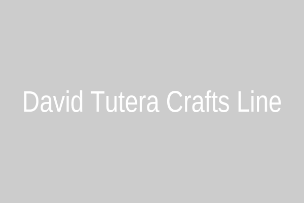 Assortment of colorful papers and embellishments from a craft line