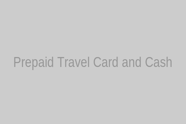 A prepaid travel card next to a stack of foreign currency