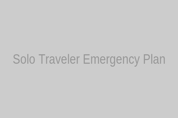 A solo traveler reviewing an emergency plan on a tablet