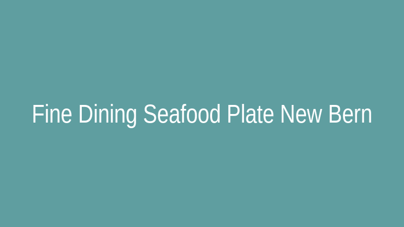 A beautifully plated fine dining seafood dish with fresh fish and vegetables in a New Bern restaurant.