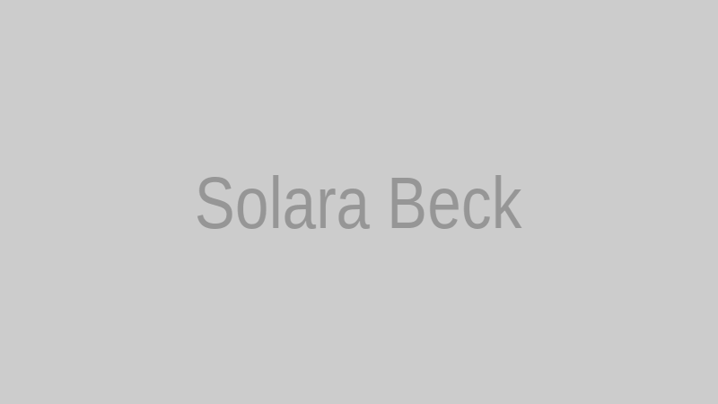 Solara Beck in a vintage style space suit with modern glowing accents